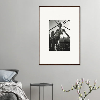 Framed black and white photograph of a person wearing an elaborate headdress or costume with spiky protrusions.