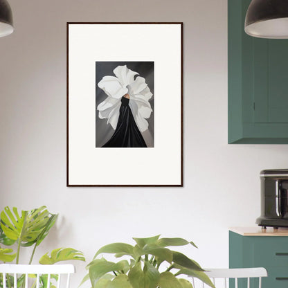 Framed black and white wall art of a figure in a white ruffled collar, petal whispers decor