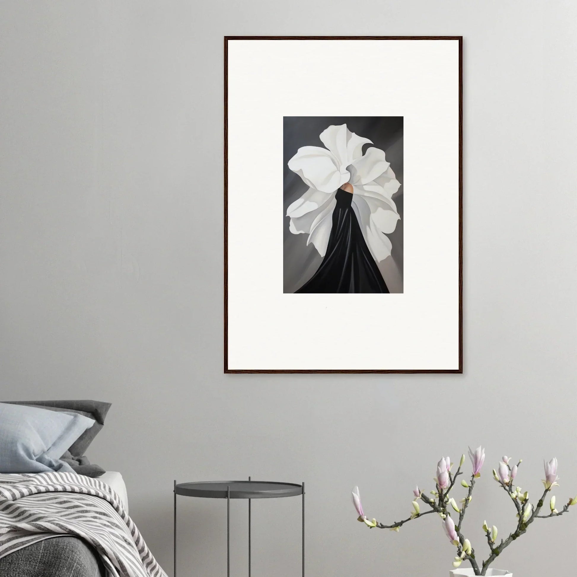 Framed black and white wall art of a white flower, perfect for room decor and petal whispers