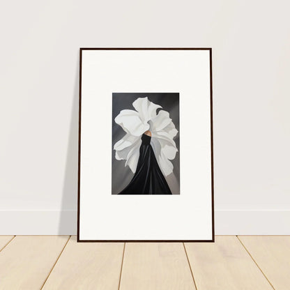 Framed black and white wall art featuring petal whispers on a dark background