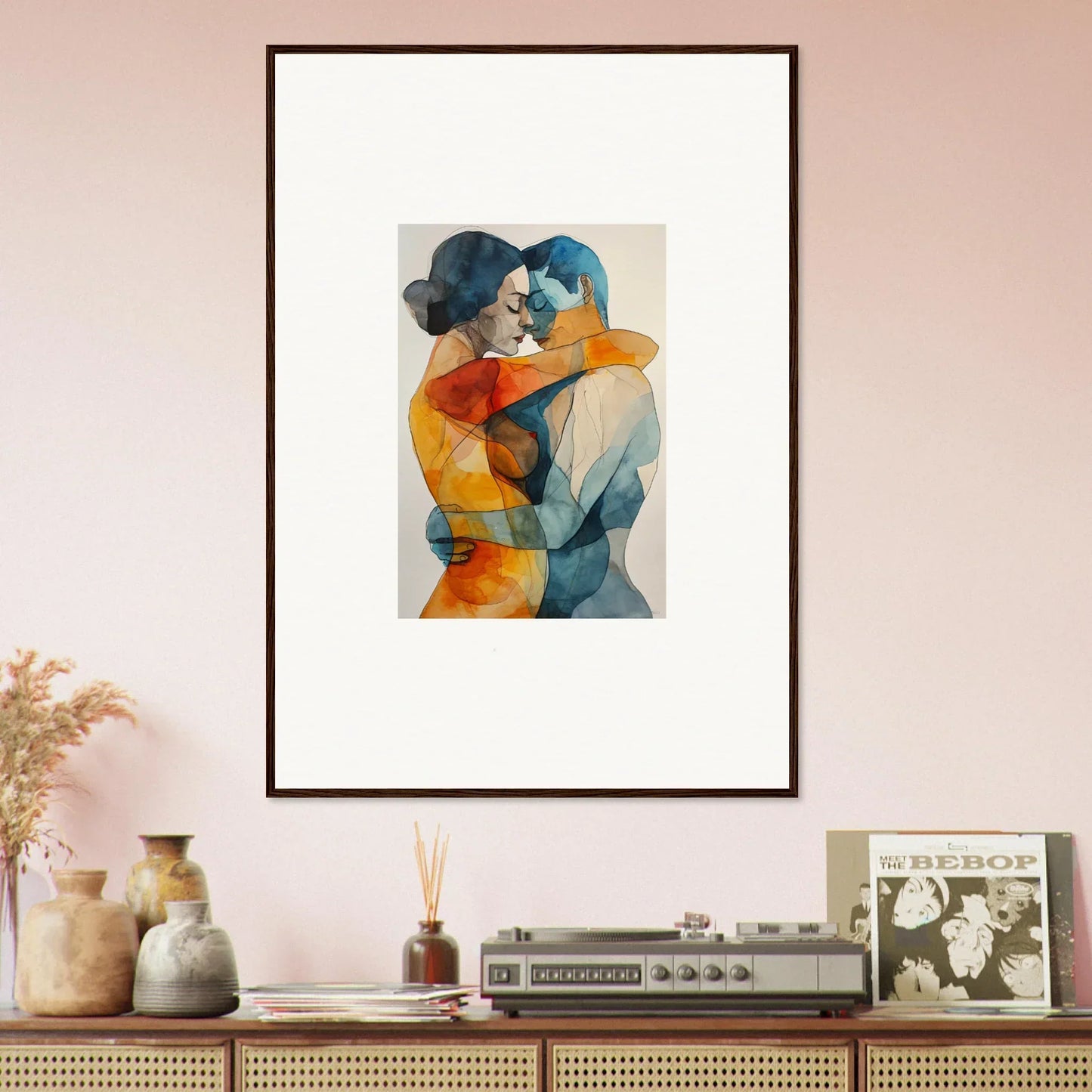 Framed abstract watercolor painting of embracing figures in blue and orange for room decor