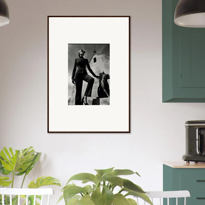 Framed black and white photograph of a muscular figure posing with a dog.