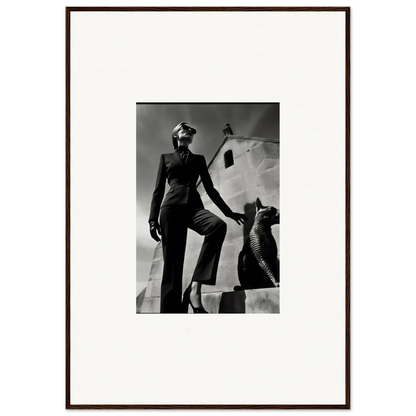 Black and white photograph of a woman in a stylish outfit posing next to a sculptural element.