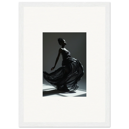 Graceful dancer in a flowing dark dress captured mid-movement.