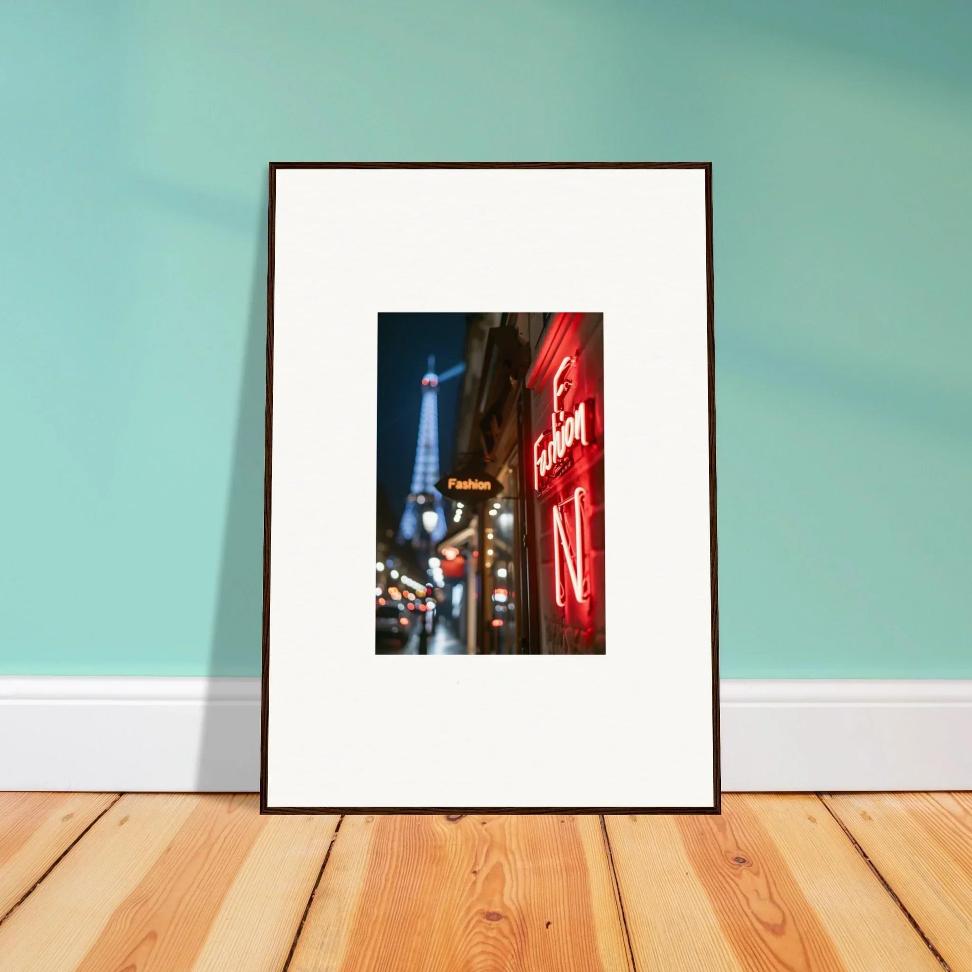 Framed wall art of a Parisian street with the Eiffel Tower and neon whispers