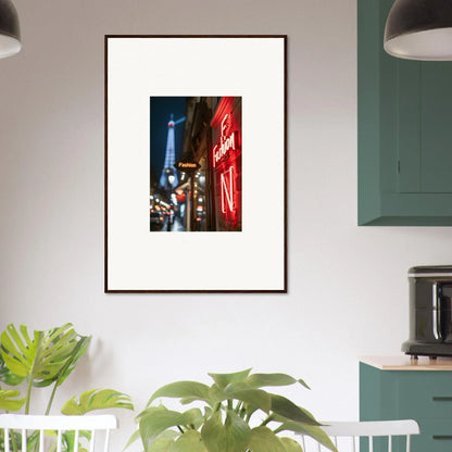 Framed wall art of a Parisian street with the Eiffel Tower and neon whispers sign