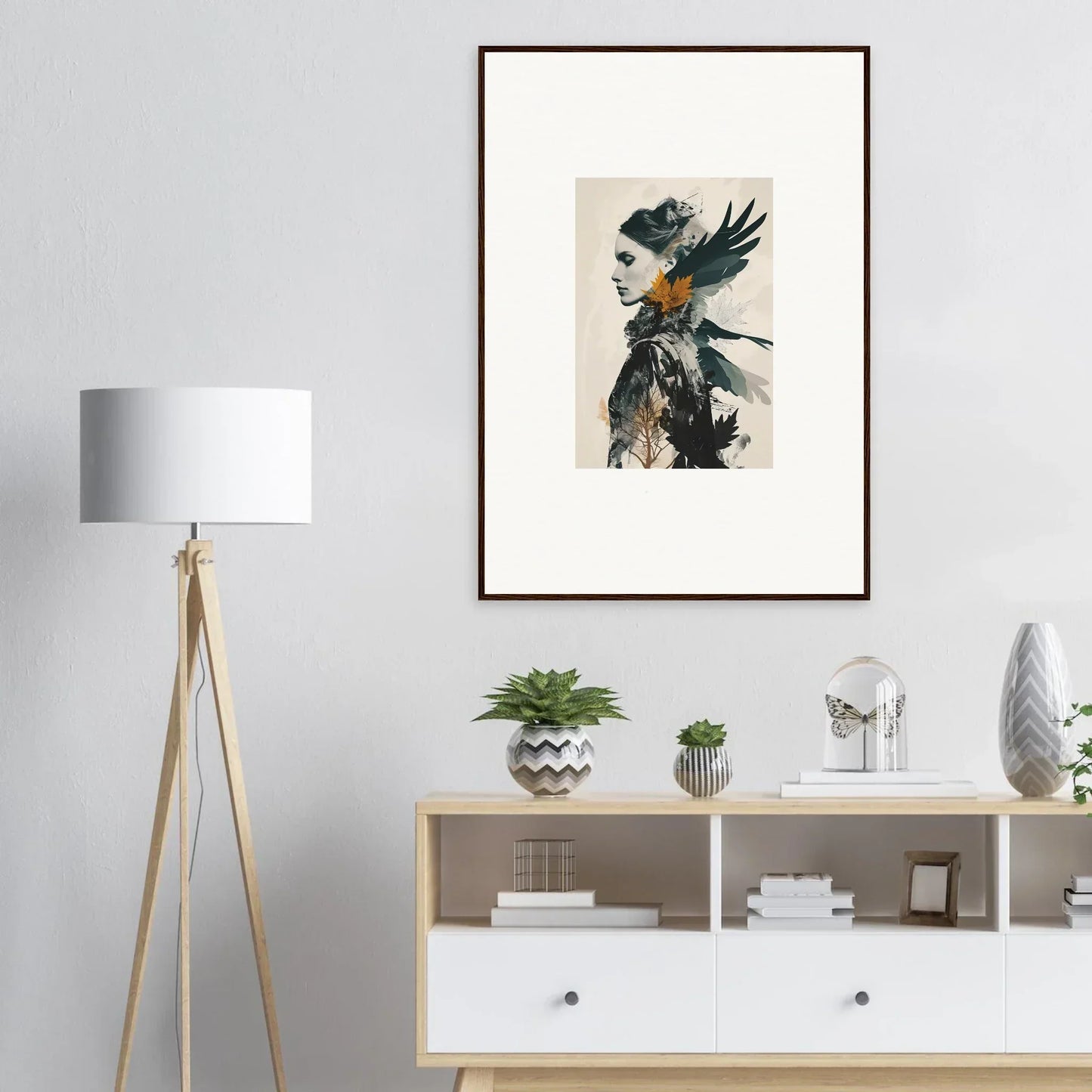 Framed wall art of a feathered figure, perfect for unique room decoration