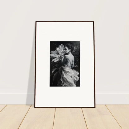 Framed black and white wall art featuring a figure with a flower in Blossom Rhapsody design