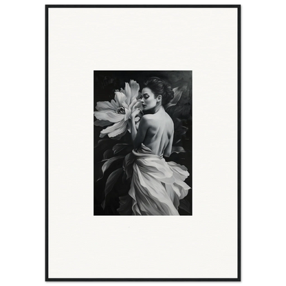 Black and white framed wall art showcasing a person with a large blossom rhapsody flower