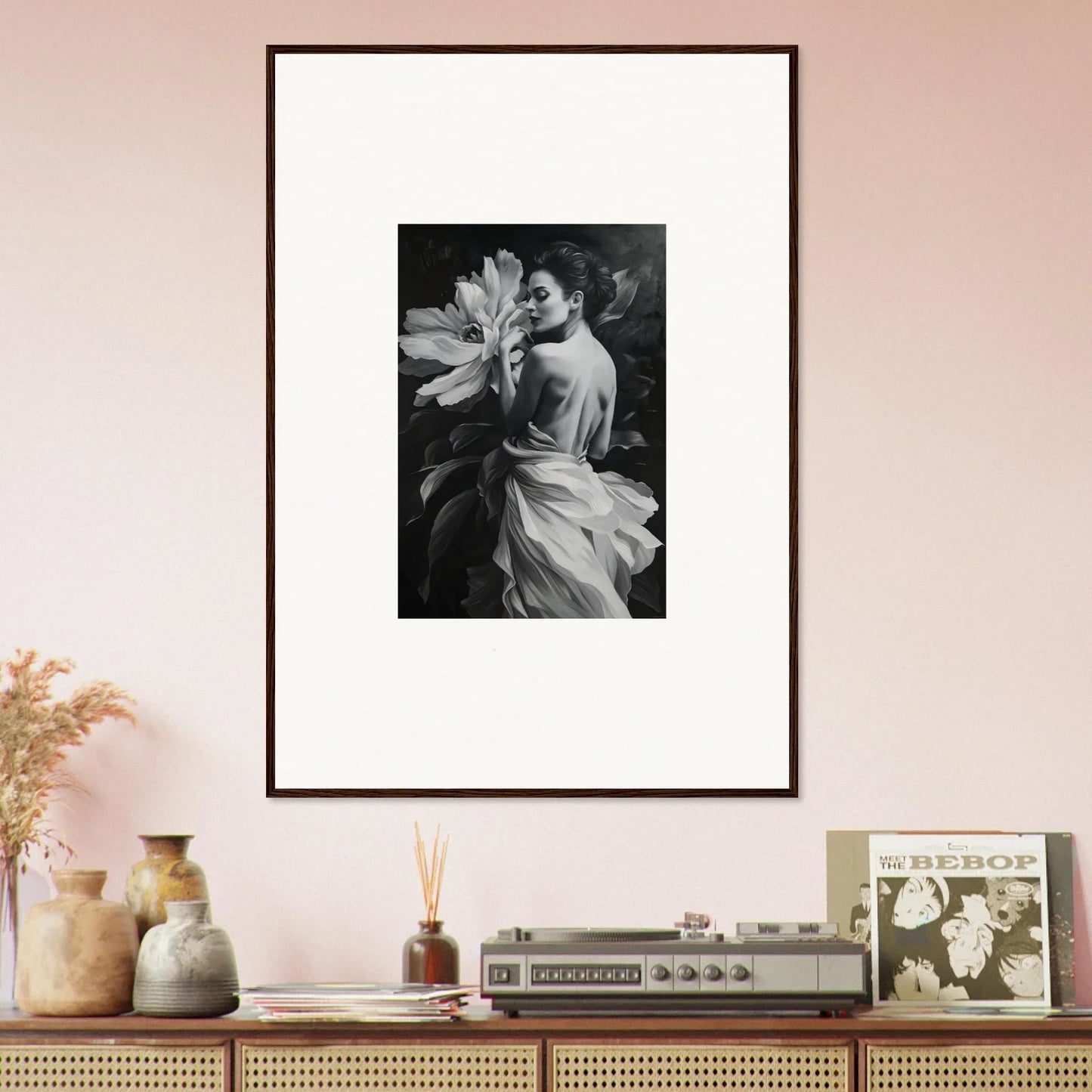 Framed black and white wall art of a person with a large flower for Blossom Rhapsody decor