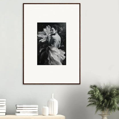 Framed black and white photograph of a figure with a large flower for Blossom Rhapsody room decor