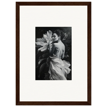 Framed black and white photograph of a person with a large flower for blossom rhapsody room decor