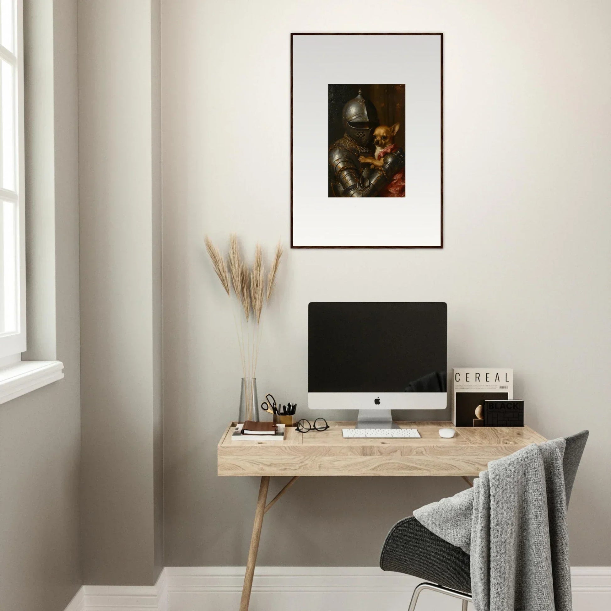 Minimalist wooden desk with computer and stylish wall art for cozy room decoration