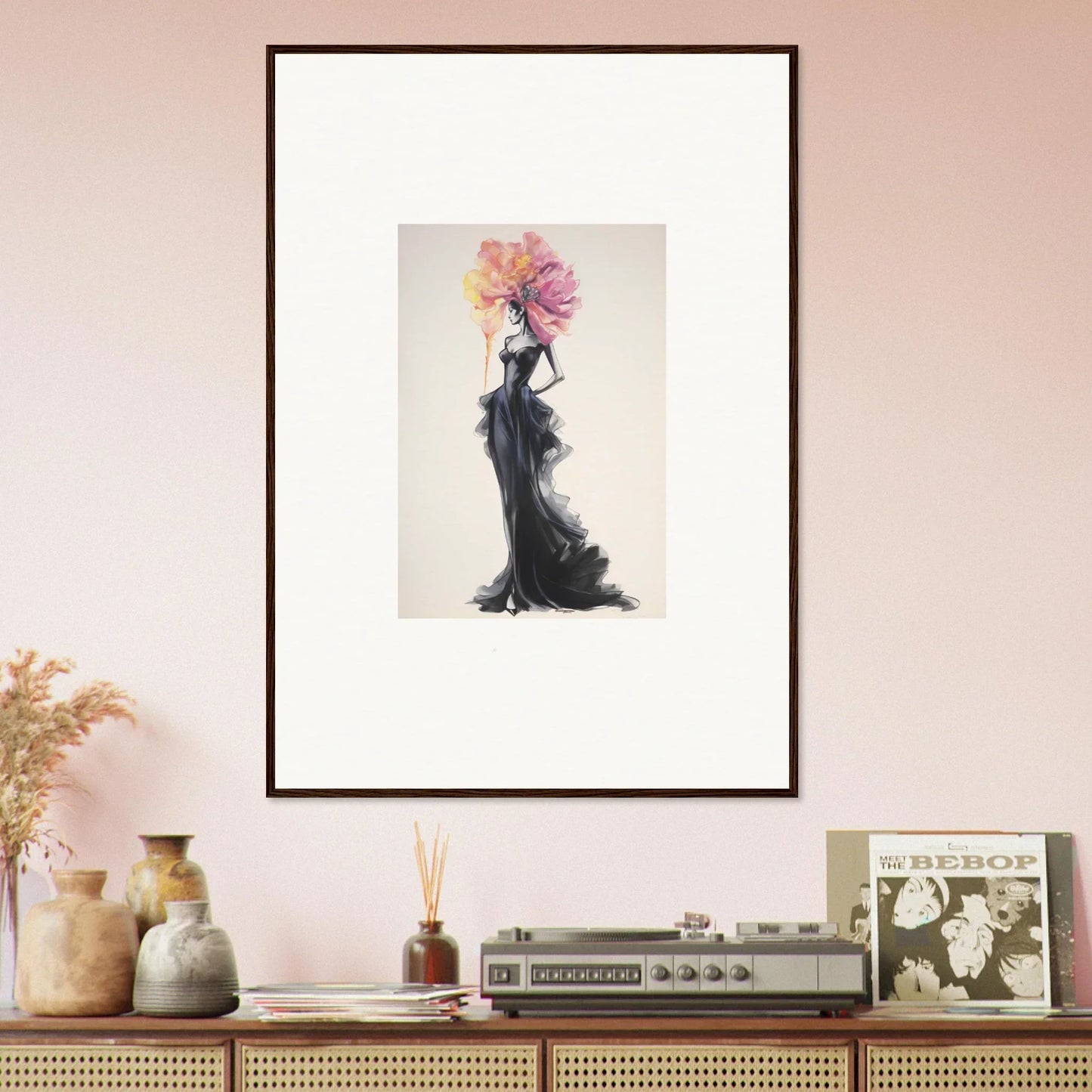 Framed wall art of a figure in a black gown with a pink floral headpiece, Sombras de Blossoms