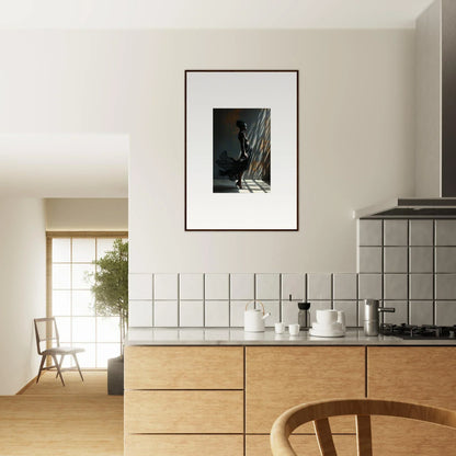 Modern kitchen with wooden cabinetry and white tiled backsplash.