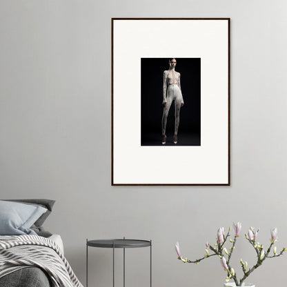 Framed black and white wall art of a standing figure for elegant room decor