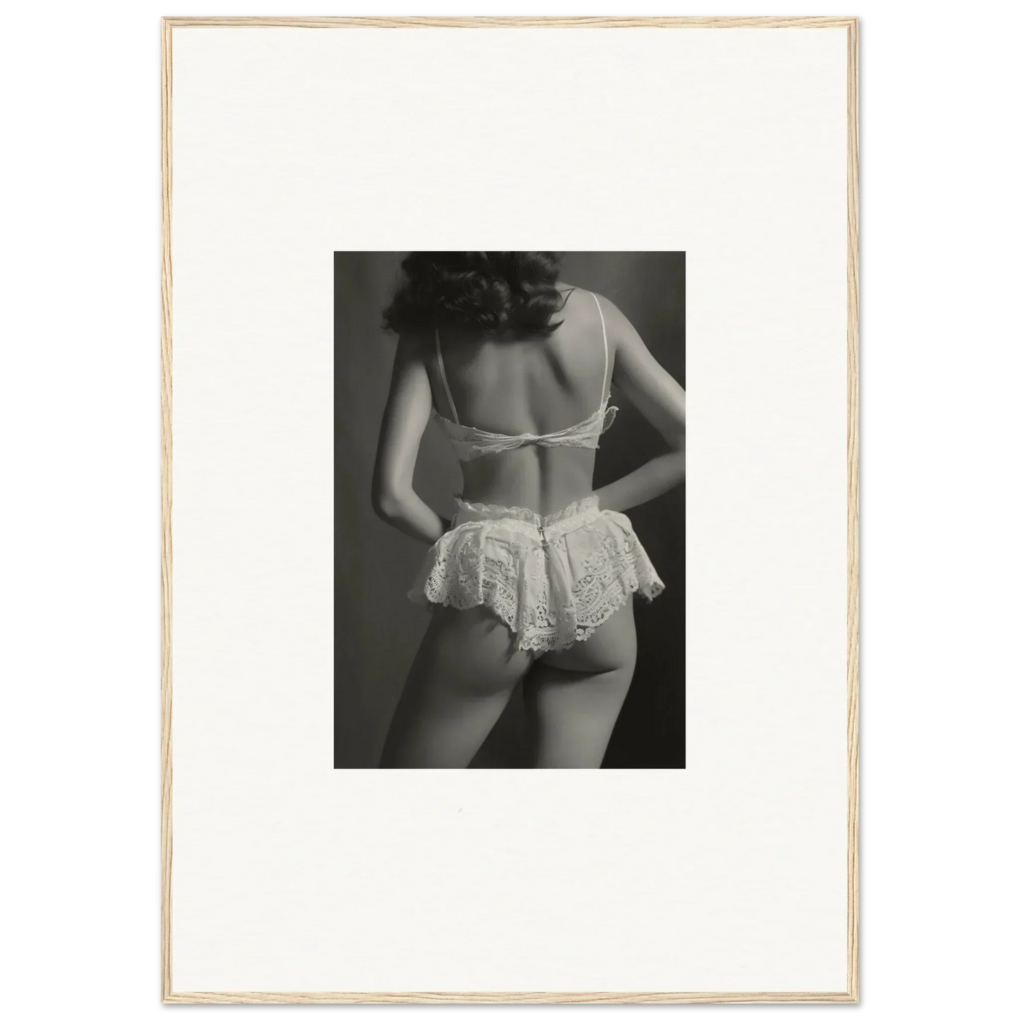 Black and white canvas print of a woman in lacy lingerie, perfect for stylish wall art