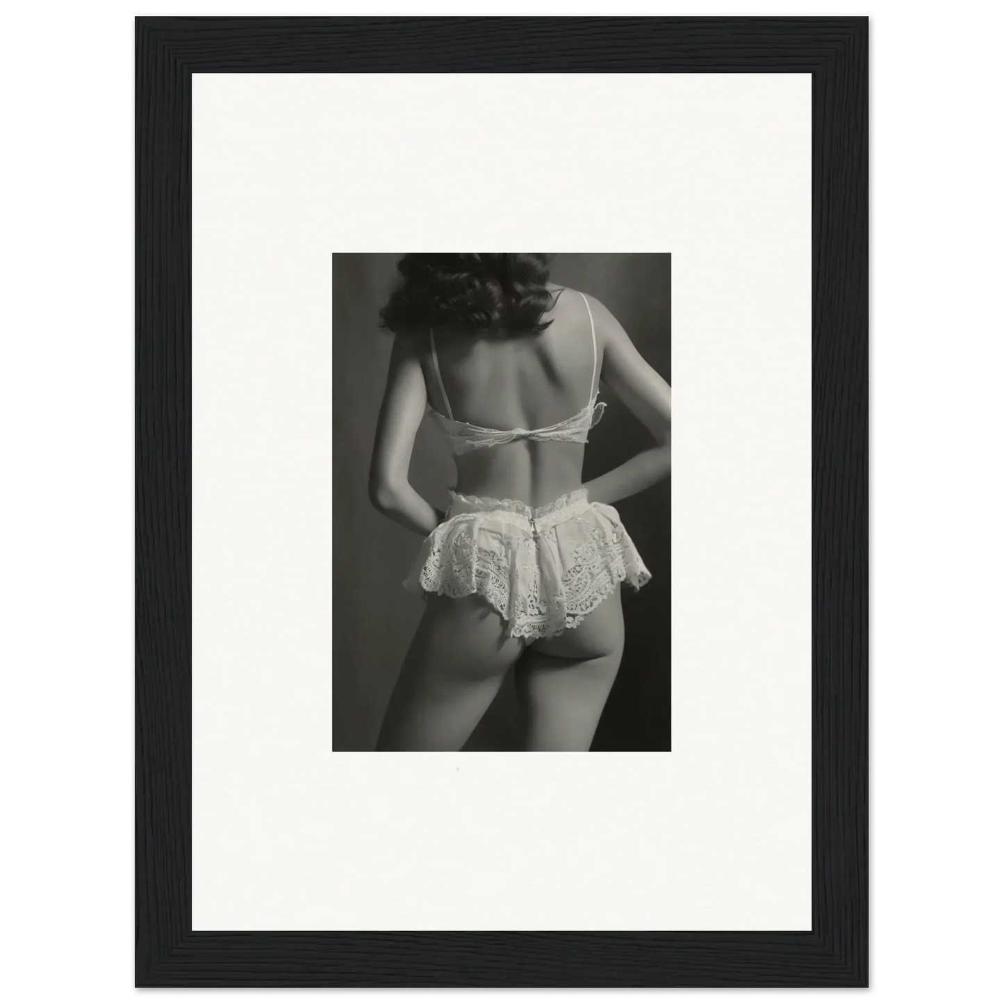 Black and white wall art of a woman in lacy lingerie for chic room decoration