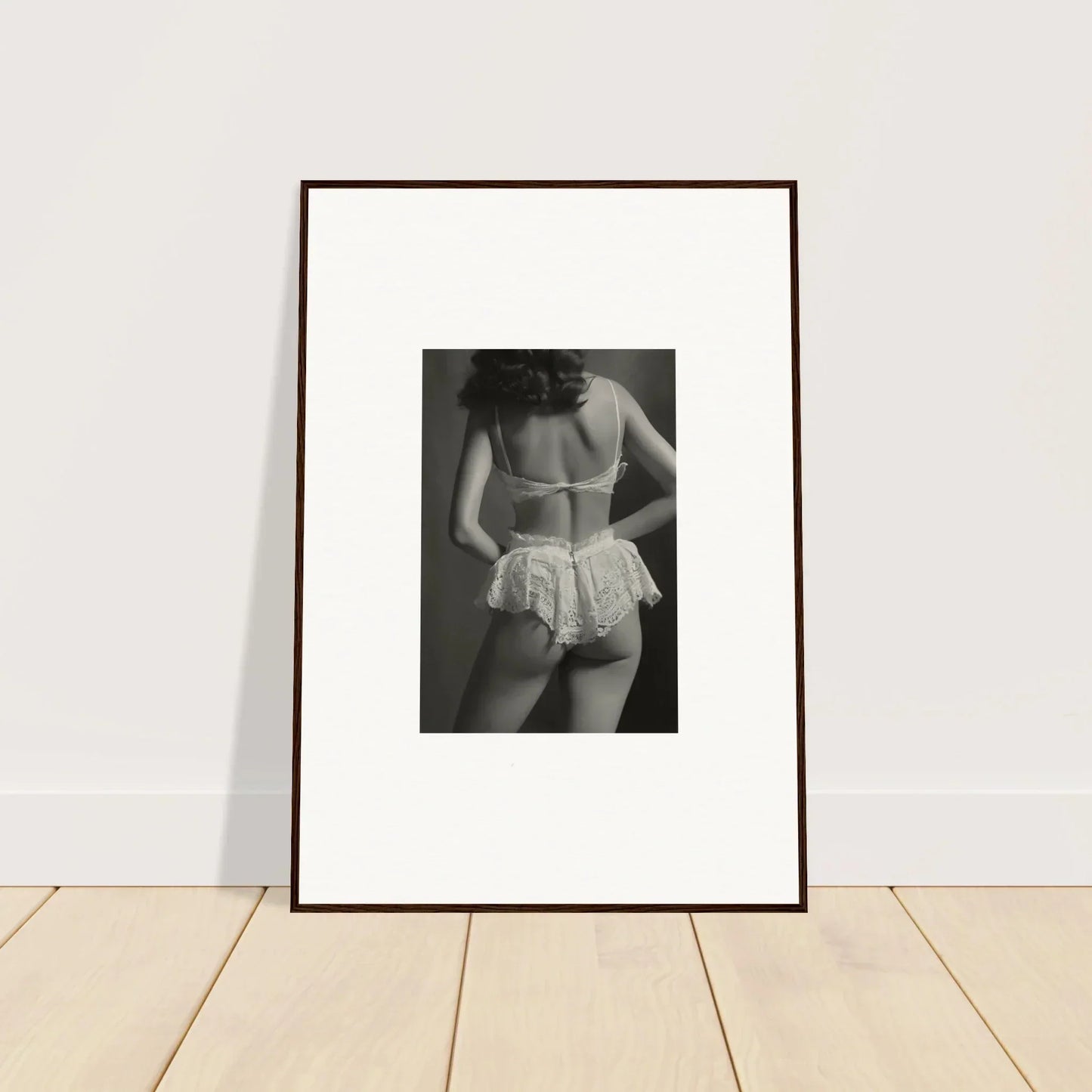 Framed black and white wall art of lacy underwear for stylish room decoration