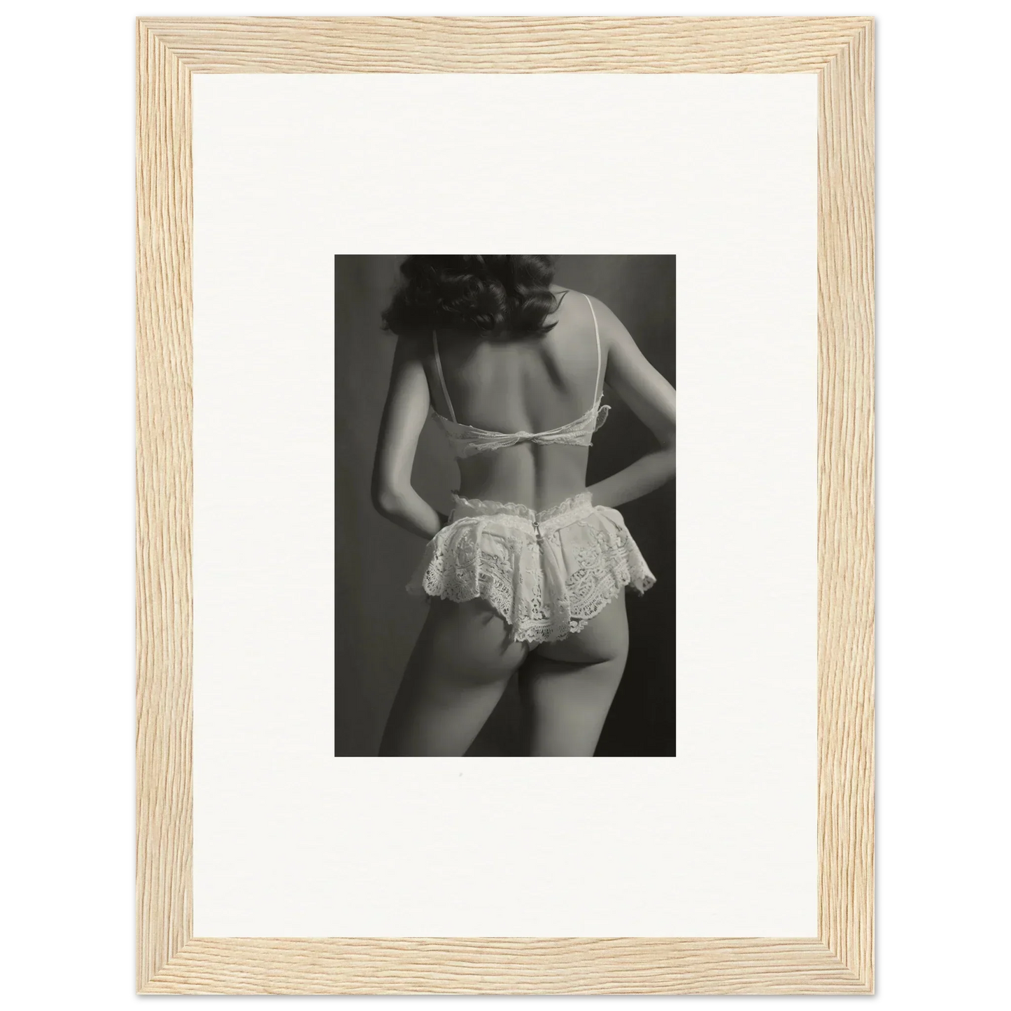 Black and white wall art of a woman in lacy lingerie for chic room decoration