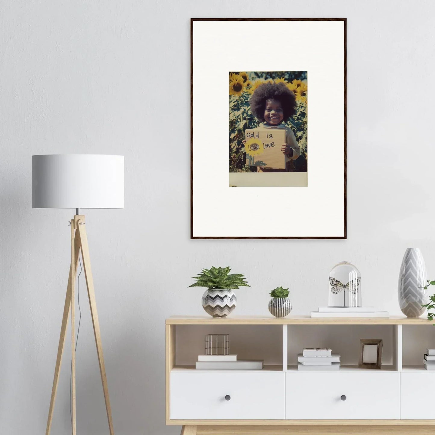 Framed photo of a person with a sign in a field of yellow flowers Sunflower Celestial Harmony