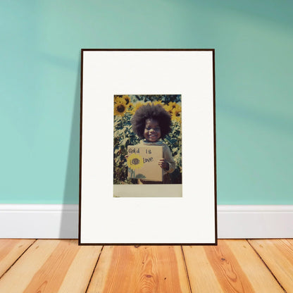 Framed photo of a person holding a sign in sunflower celestial harmony art