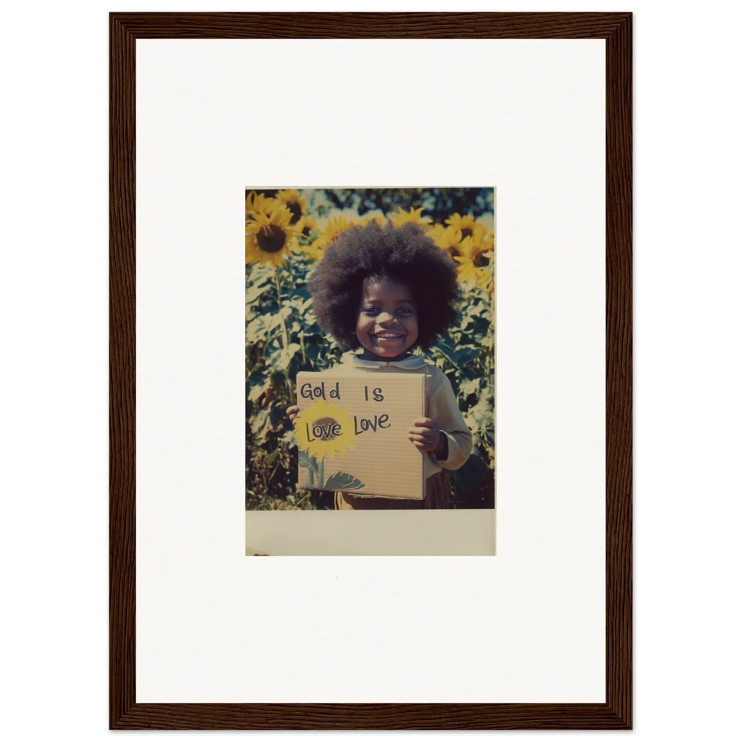 Framed photo of a person with an afro in a sunflower field, celebrating Sunflower Celestial Harmony