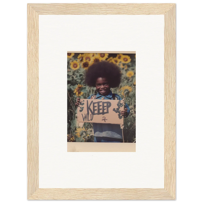 Framed photo of a child with a KEEP sign in a sunflower field for room decoration