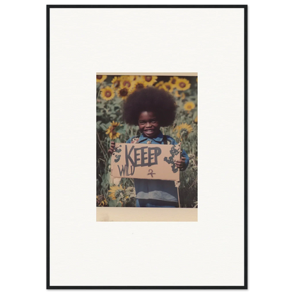 Framed photo of a child with a KEEP sign in a sunflower field for room decoration