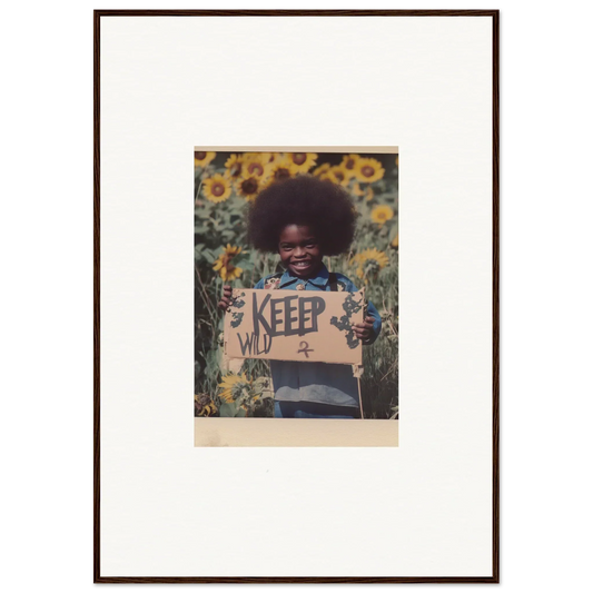 Framed photo of a person holding a KEEP sign in a sunflower field, perfect for room decoration