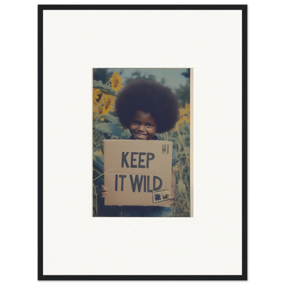 Framed Sunflower Soulfulness Snapshot of someone holding a KEEP IT WILD sign