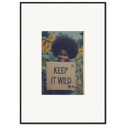 Framed photograph of a person with a KEEP IT WILD sign in Sunflower Soulfulness Snapshot