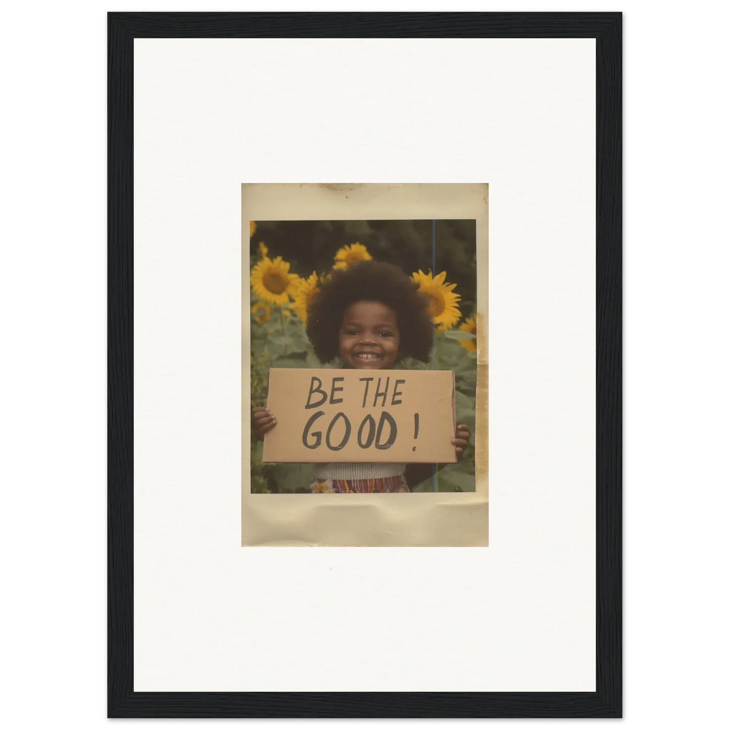 Framed wall art of Be the Good sign among sunflowers from Sunflower Utopia Surge