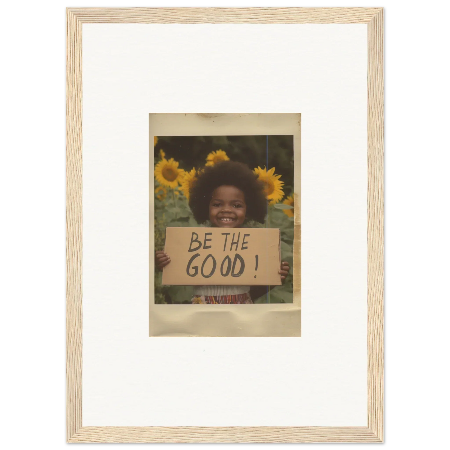 Framed wall art in Sunflower Utopia Surge capturing joy with sunflowers and a BE THE GOOD sign