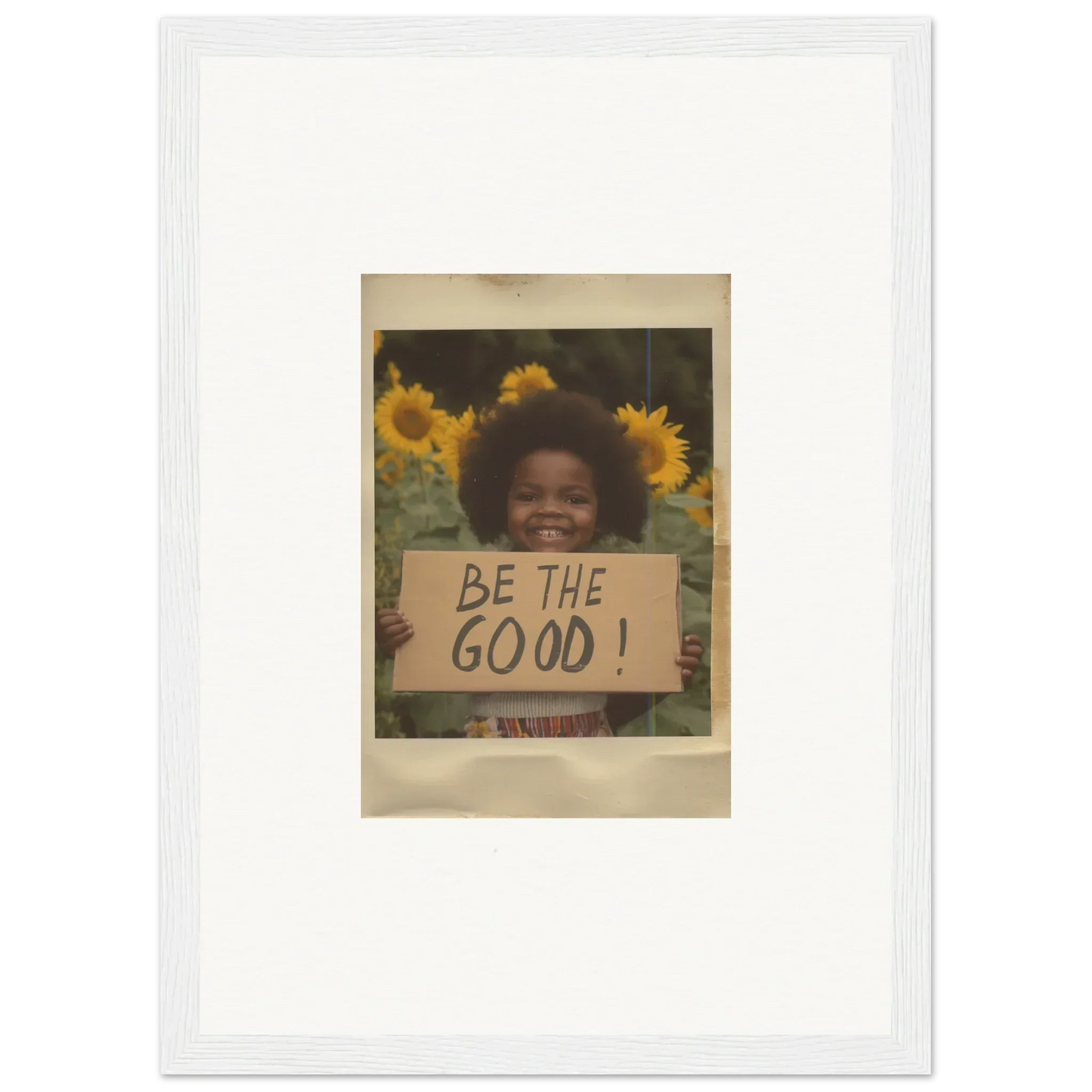 Vintage-style photograph of BE THE GOOD sign and sunflowers, perfect for Sunflower Utopia Surge