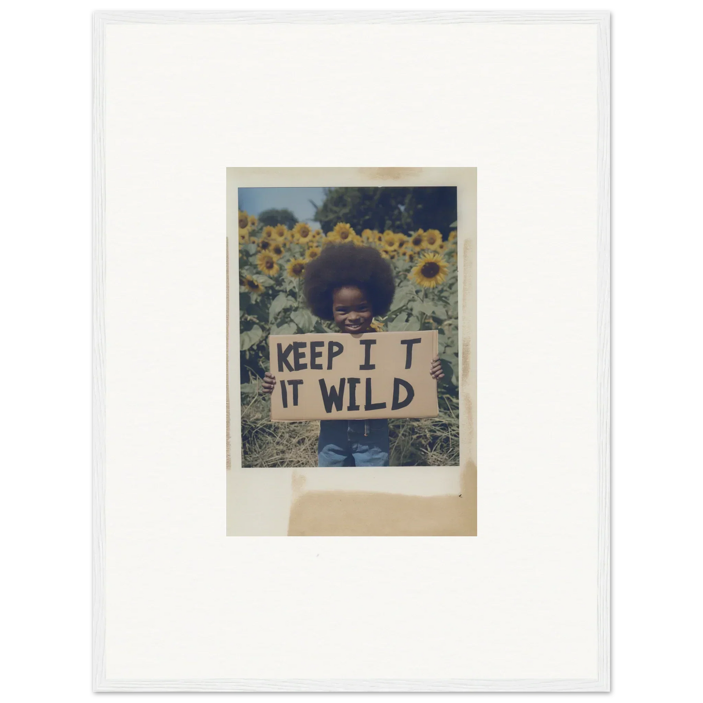 Framed Polaroid of person holding KEEP IT WILD sign in Sunflower Wilderness Whispers