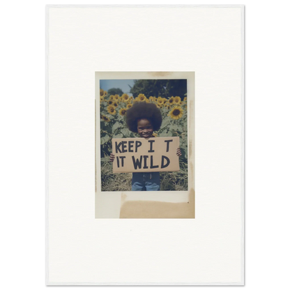 Polaroid of person with KEEP IT WILD sign in Sunflower Wilderness Whispers field