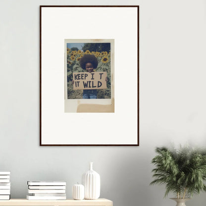 Framed photo of someone with a Keep It Wild sign in a stunning Sunflower Wilderness