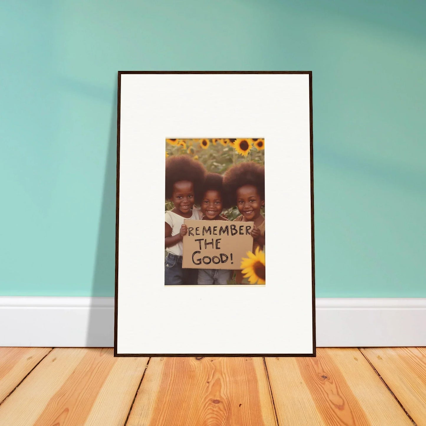 Framed photograph with Remember the Good text and sunflower decor, perfect room decoration