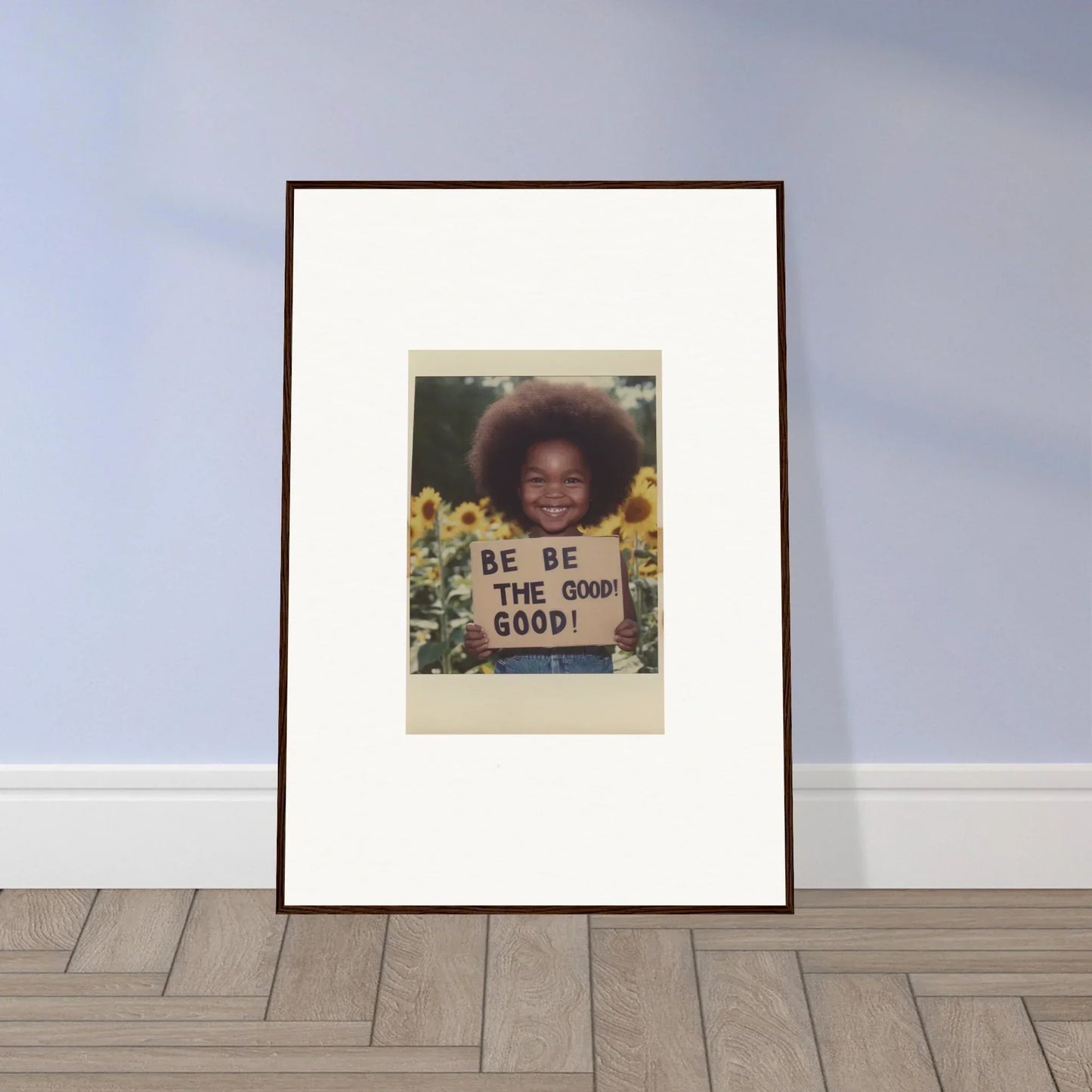 Framed wall art with a BE THE GOOD sign in sunflowers from Sunflower’s Gentle Whisper