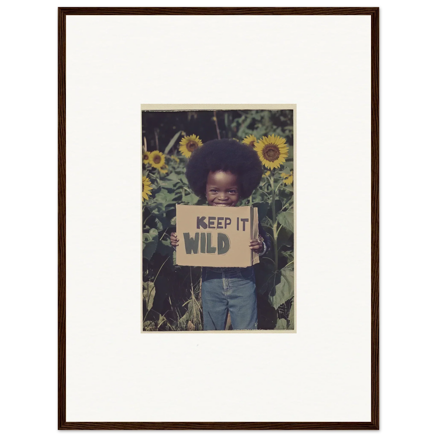 Child with KEEP IT WILD sign in sunflowers for cool Cosmos Unchained canvas print