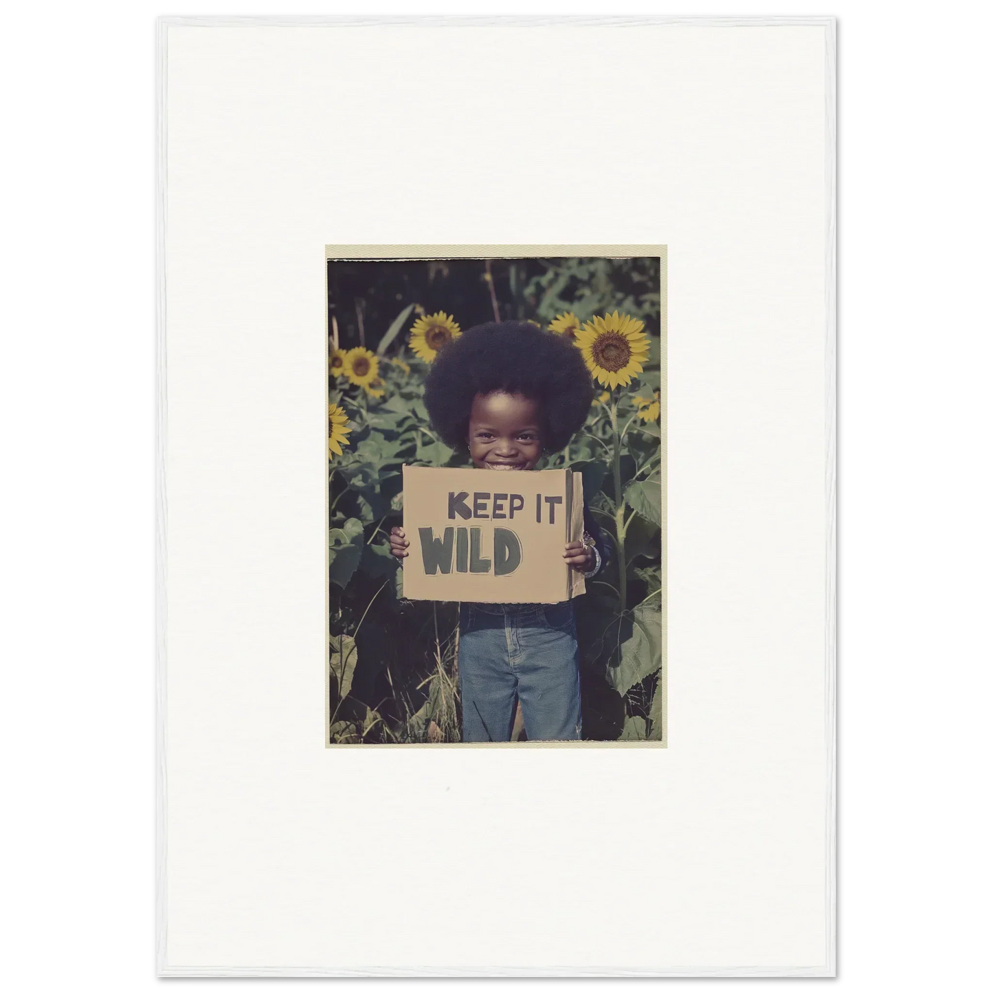 Person with KEEP IT WILD sign in sunflowers for a vibrant Cosmos Unchained canvas print