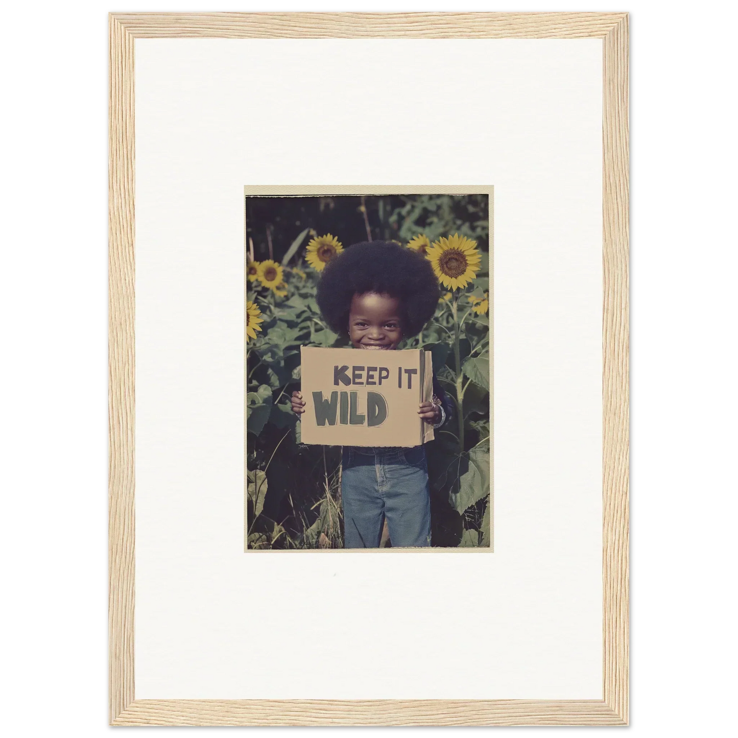 Framed photo of a kid with KEEP IT WILD sign and sunflowers for cozy room decoration