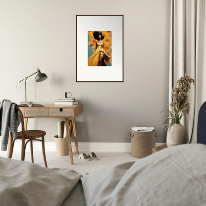 Framed orange and black Sunset Radiance Muse art print on a gray wall with natural wood