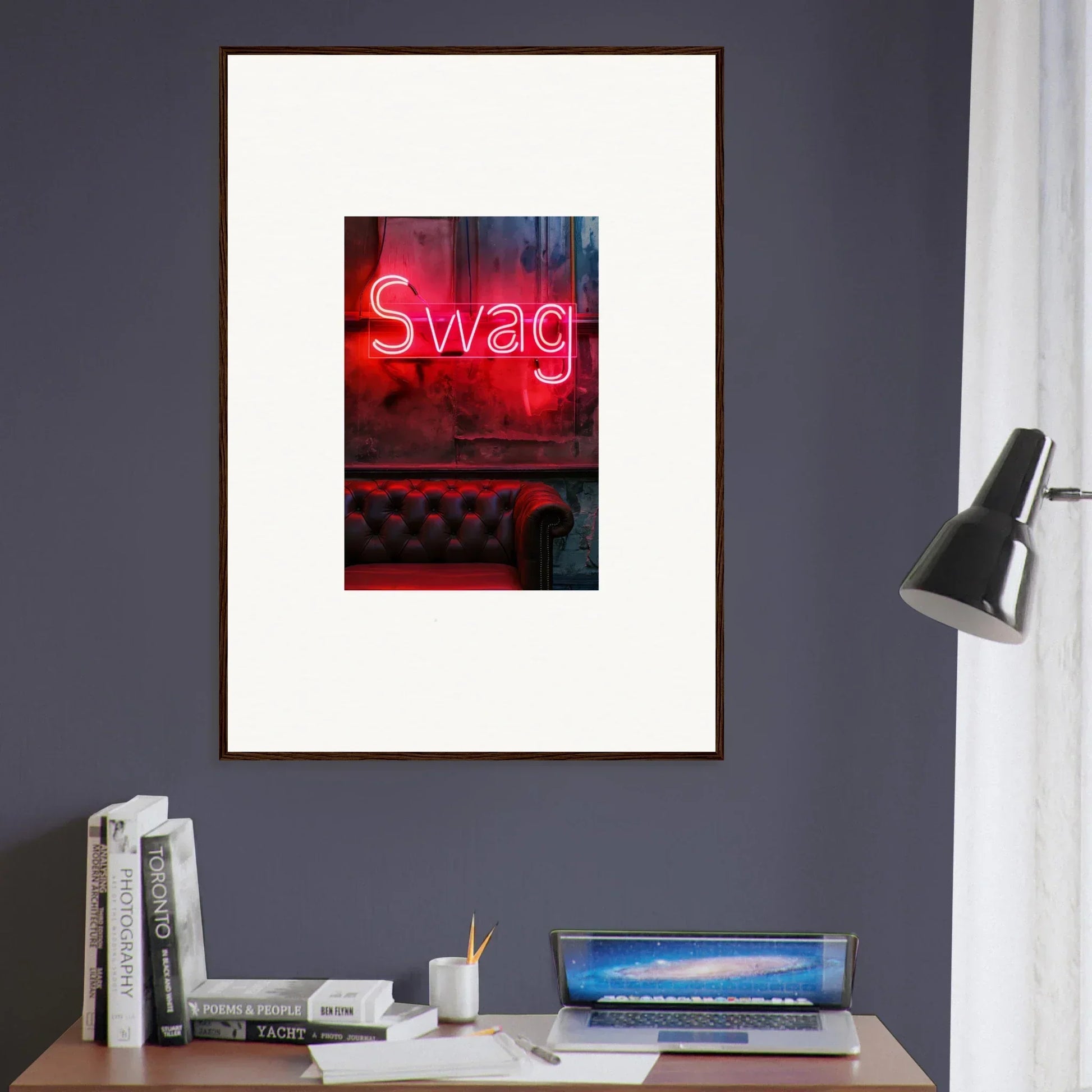 Framed wall art with neon Swag sign above tufted leather for cool room decoration