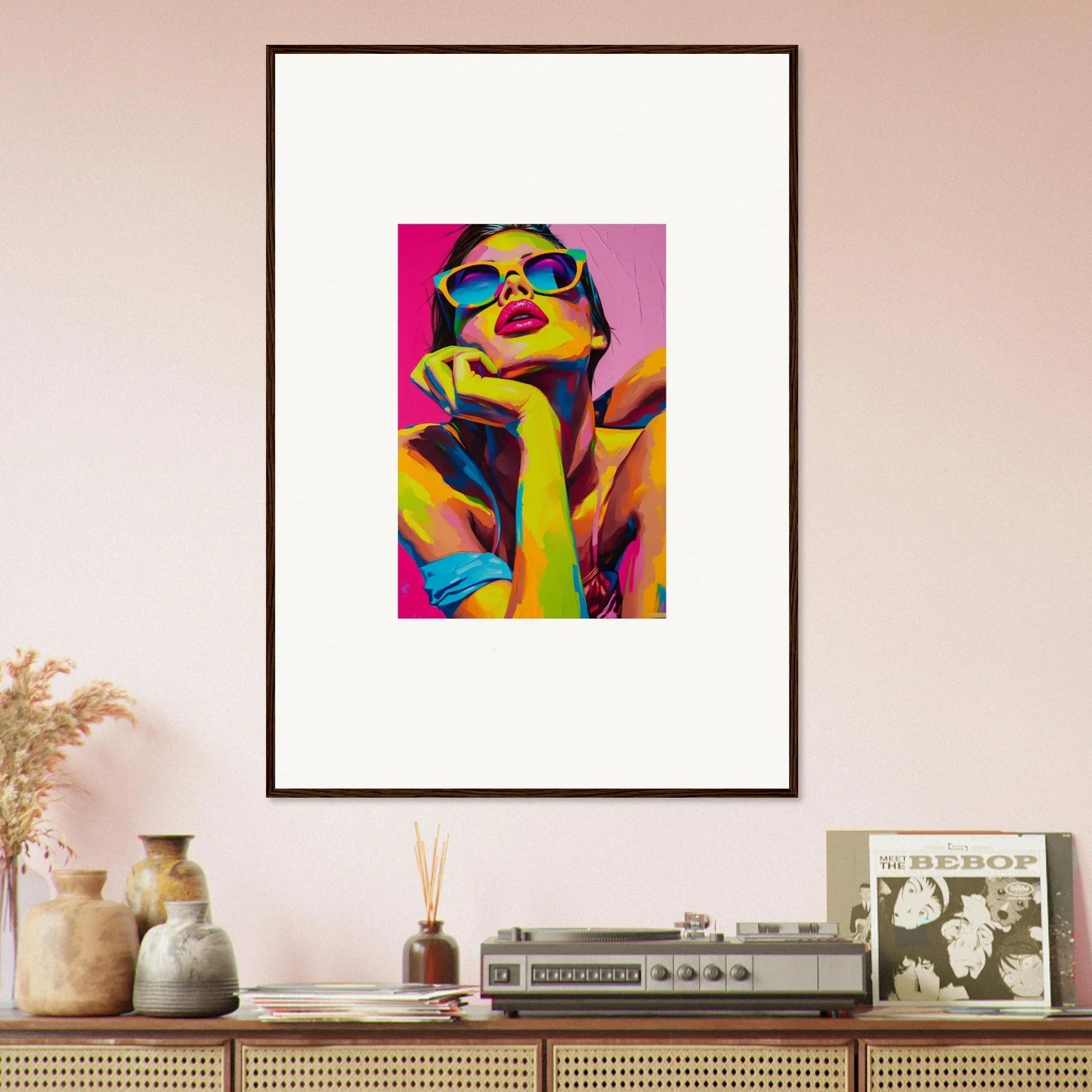 Framed wall art of a colorful pop art portrait for vibrant room decor