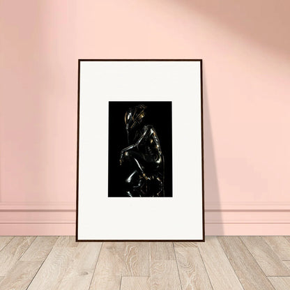 Framed black and white artwork depicting a shadowy human figure.