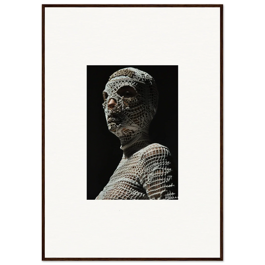 Sculpture of a human head and upper torso covered in a mosaic-like pattern.