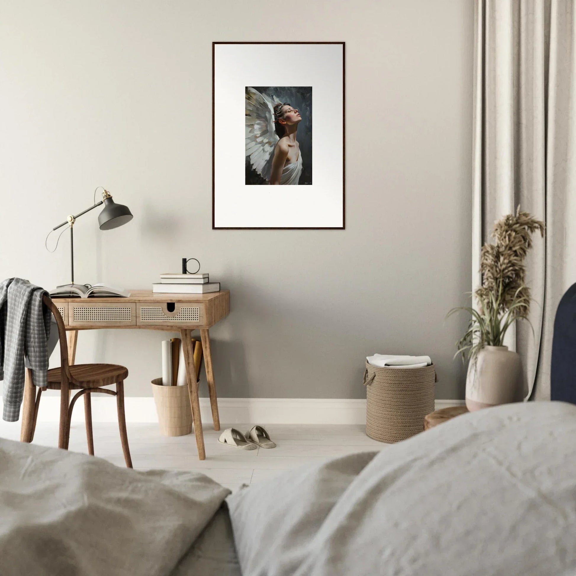 Framed wall art of a person with feathered wings in a light orchard setting