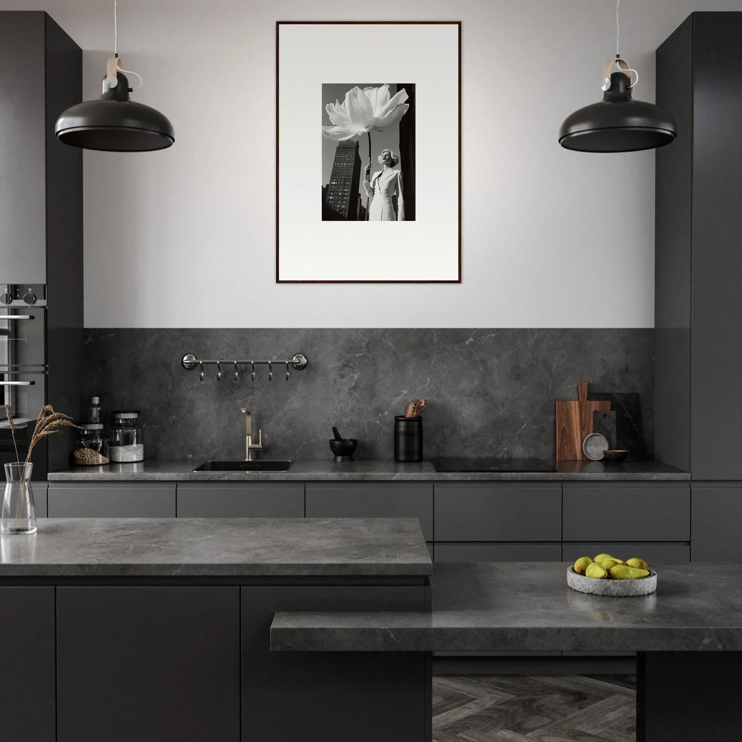 Modern, sleek kitchen with dark gray cabinetry and countertops.